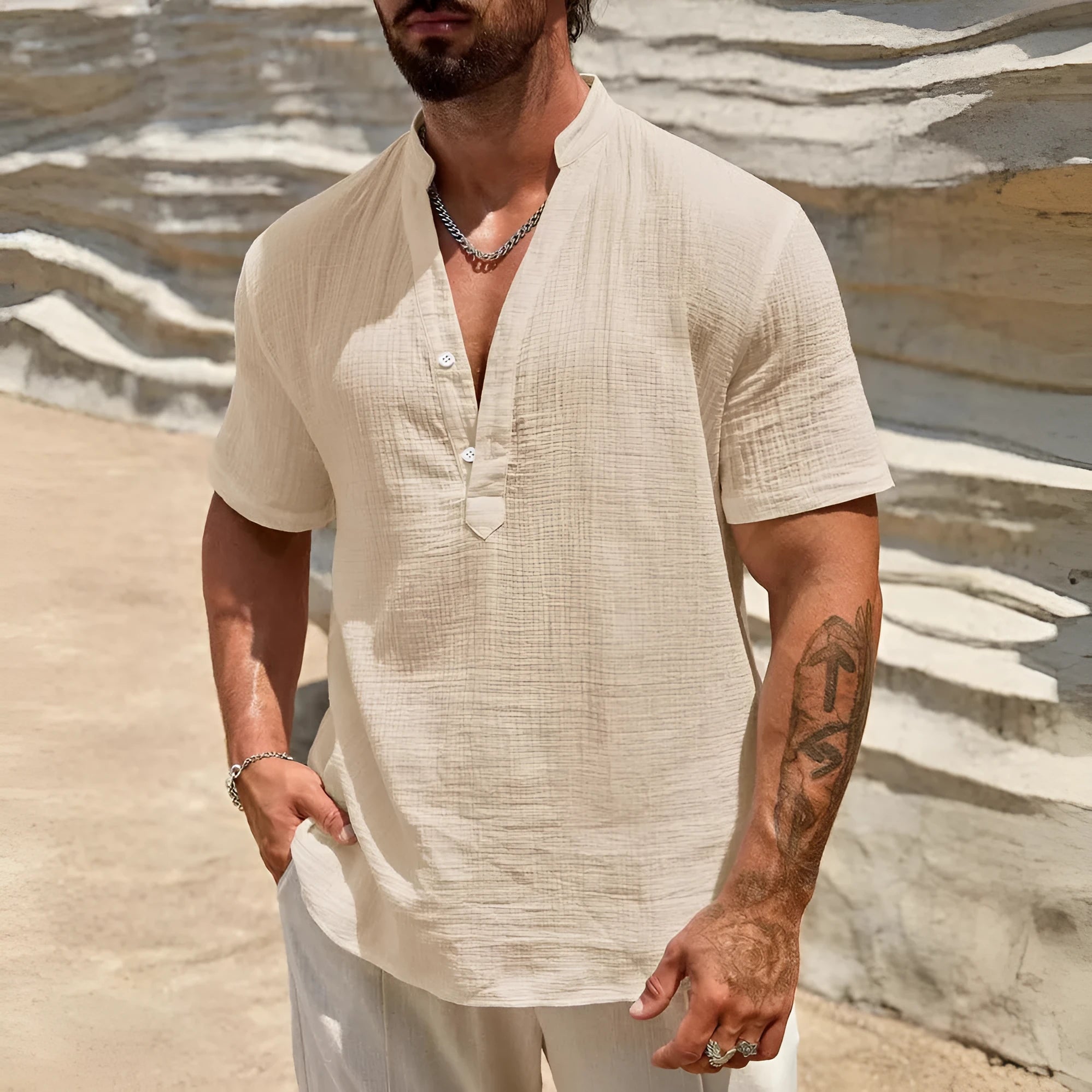 Men's solid colour short sleeve casual shirt with stand collar in a light blue shade.