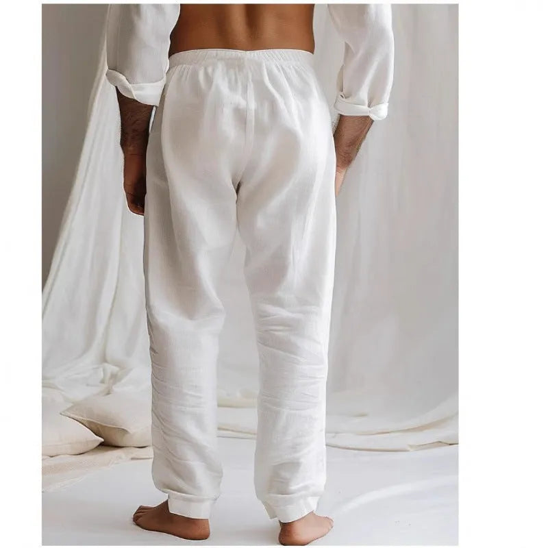 Men's light grey loose-fit summer trousers with elastic waistband and straight leg opening
