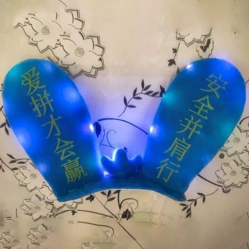 Rabbit Glow Ears helmet ornament with Velcro bottom in multiple colour options including blue, yellow, red, and purple.