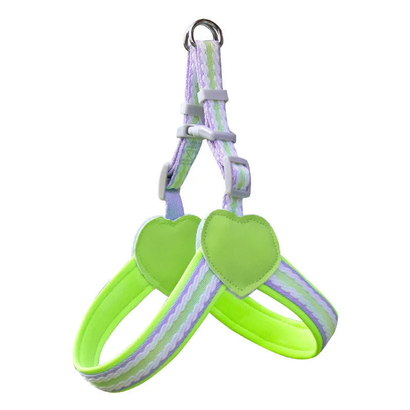 Nylon dog walking chest strap vest with an attached hand holding rope, shown in emerald green.