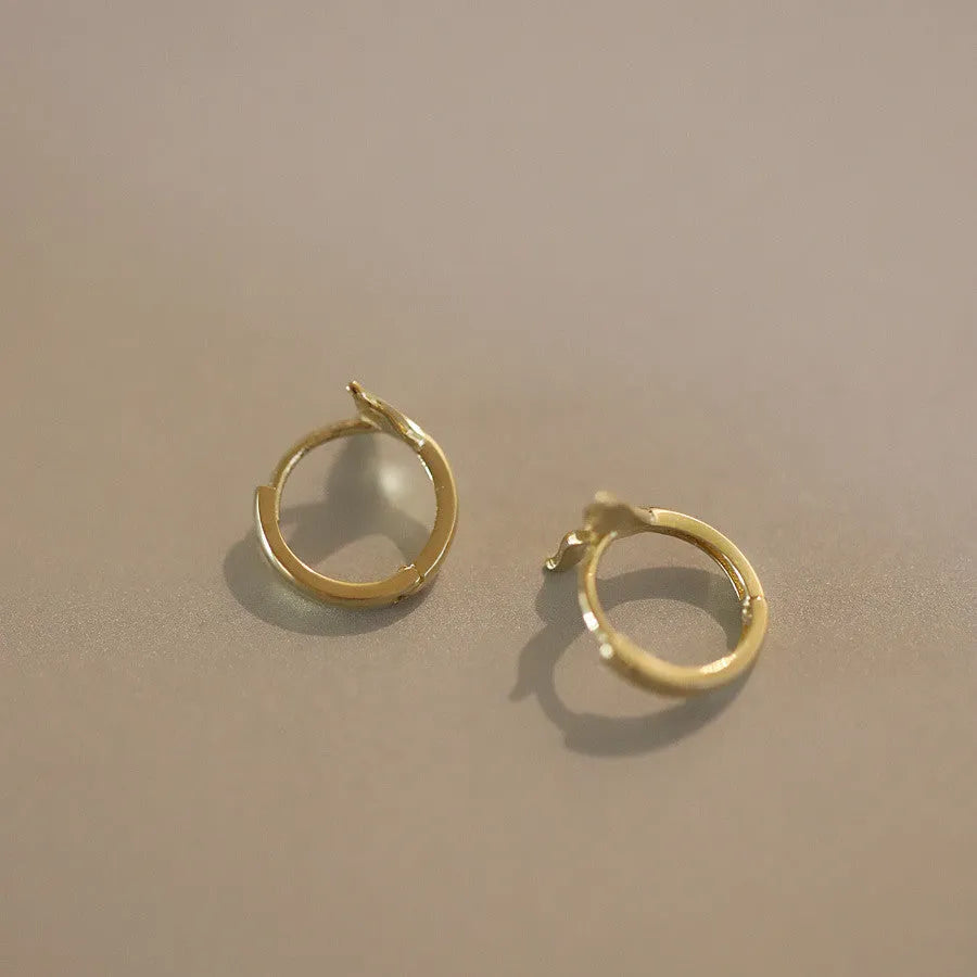 S925 sterling silver fishtail earrings with 14k gold plating in gold colour