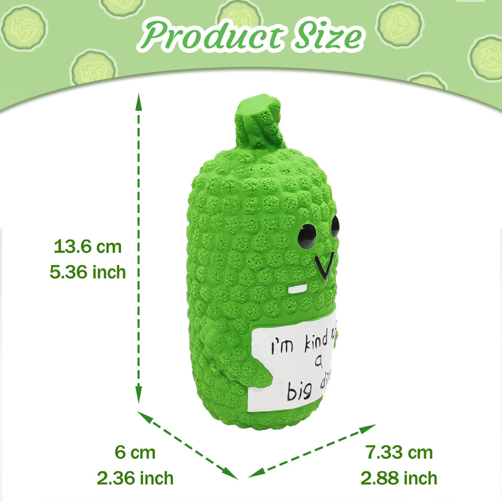 Green pickle-shaped squeaky dog chew toy with textured surface.