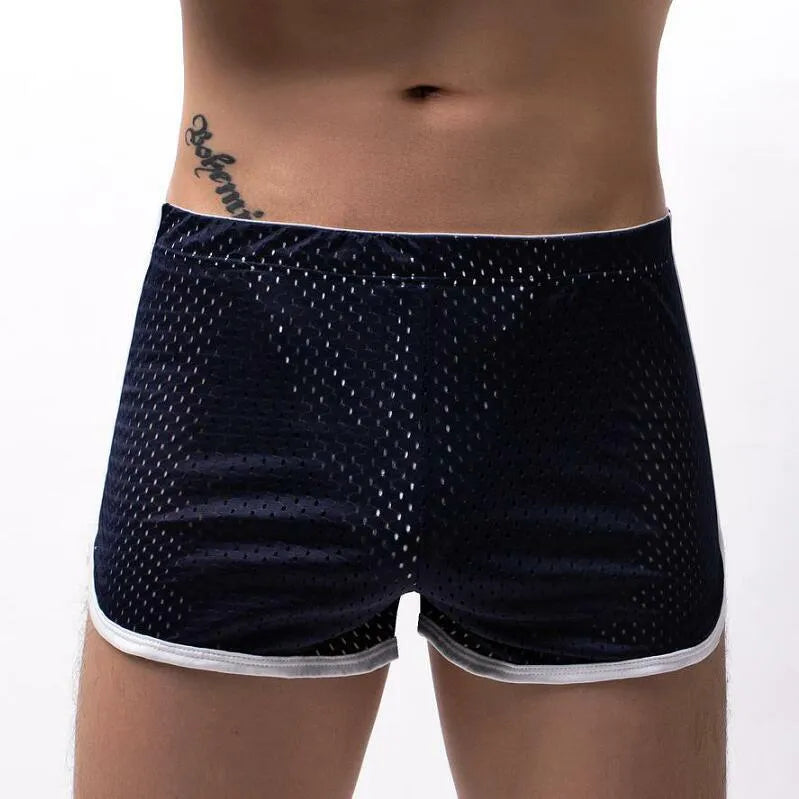 Men's cotton boxer shorts in multiple colours on a mid-waist fit model