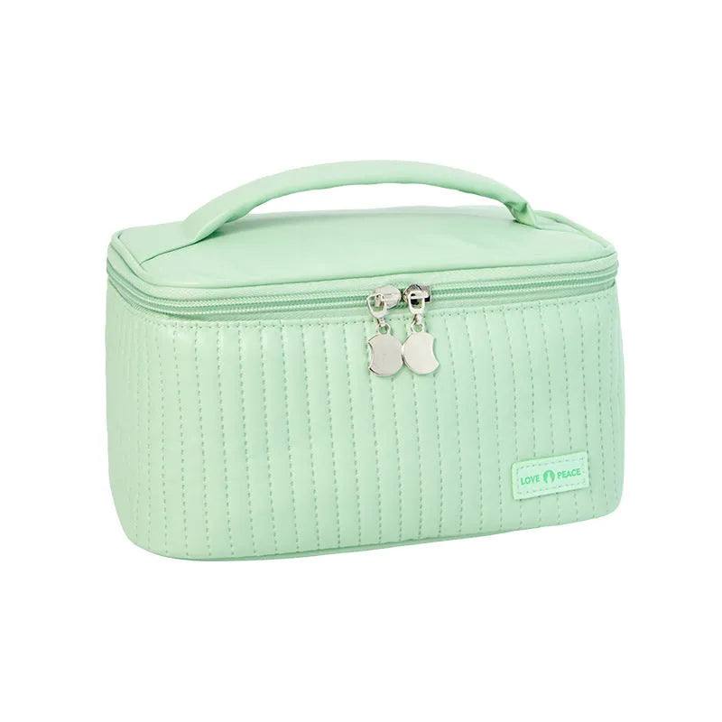 Open-top solid colour PU leather makeup bag in a choice of six colours.