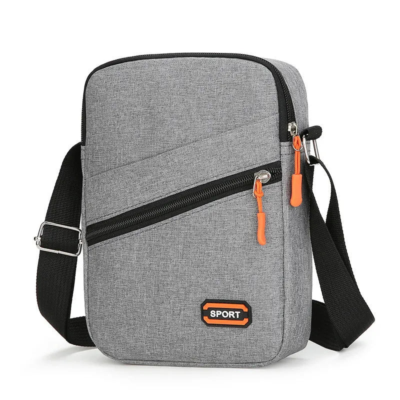 Oxford cloth commuter bag in black, navy blue, or silver grey with contrasting details