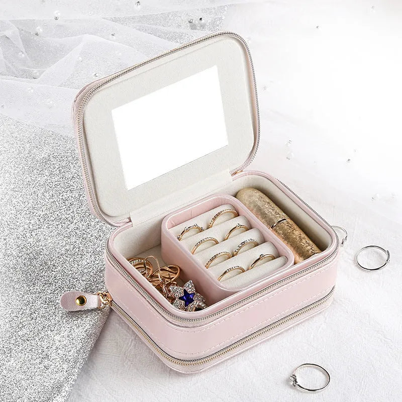 Simple zipper jewellery box in pink made from soft PU material with compact 11.5x8.5x5cm size