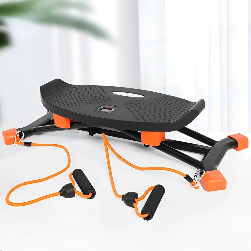 Black JS101A mini fitness skiing machine with elastic hand straps on a home floor