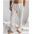 Men's light grey loose-fit summer trousers with elastic waistband and straight leg opening
