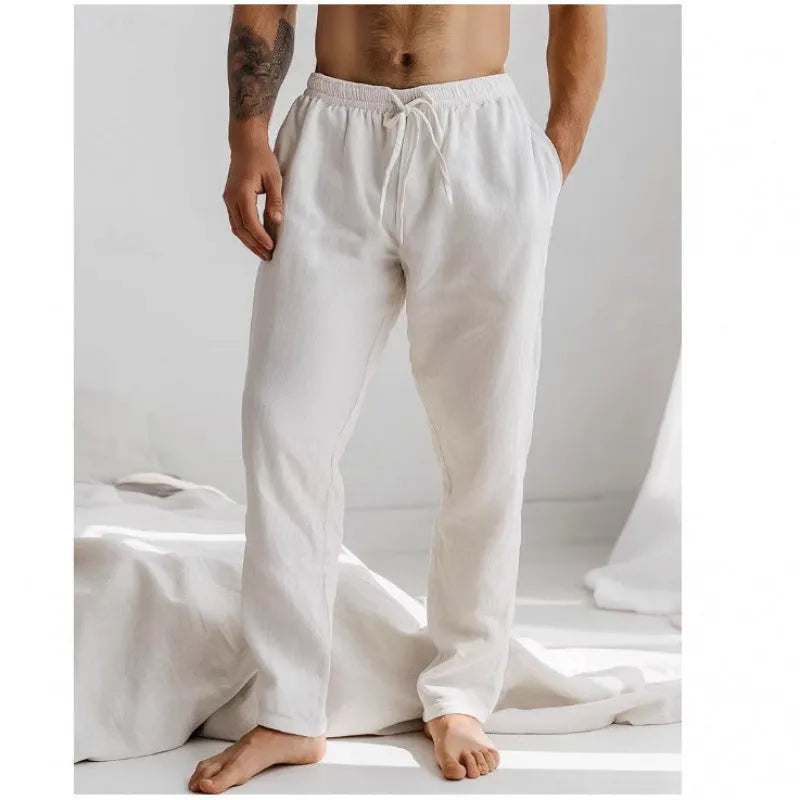 Men's light grey loose-fit summer trousers with elastic waistband and straight leg opening