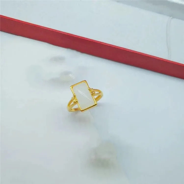 Adjustable brass gold-plated ring with long gemstone inlay in national style design