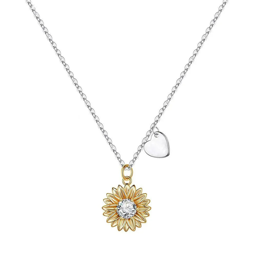 Women's 925 sterling silver sunflower necklace with daisy petal pendant on an adjustable cross chain.