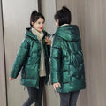 A women's loose-fitting thick hooded winter jacket in an acrylic polyester fabric.