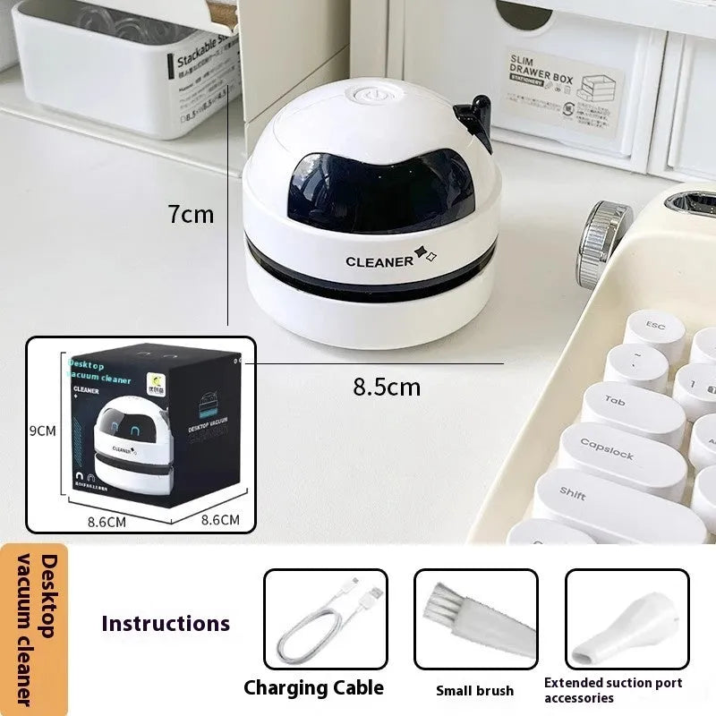USB charging handheld desktop vacuum cleaner in multiple colour options including blue, orange, and grey white designs