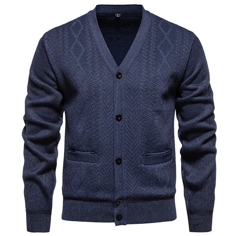 Man wearing a brown and white striped cardigan sweater with a wool lining.