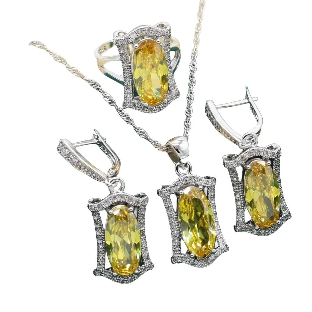 Olive and yellow anti-allergy alloy zircon jewellery set showing necklace, earrings, ring, and bracelet on a display.