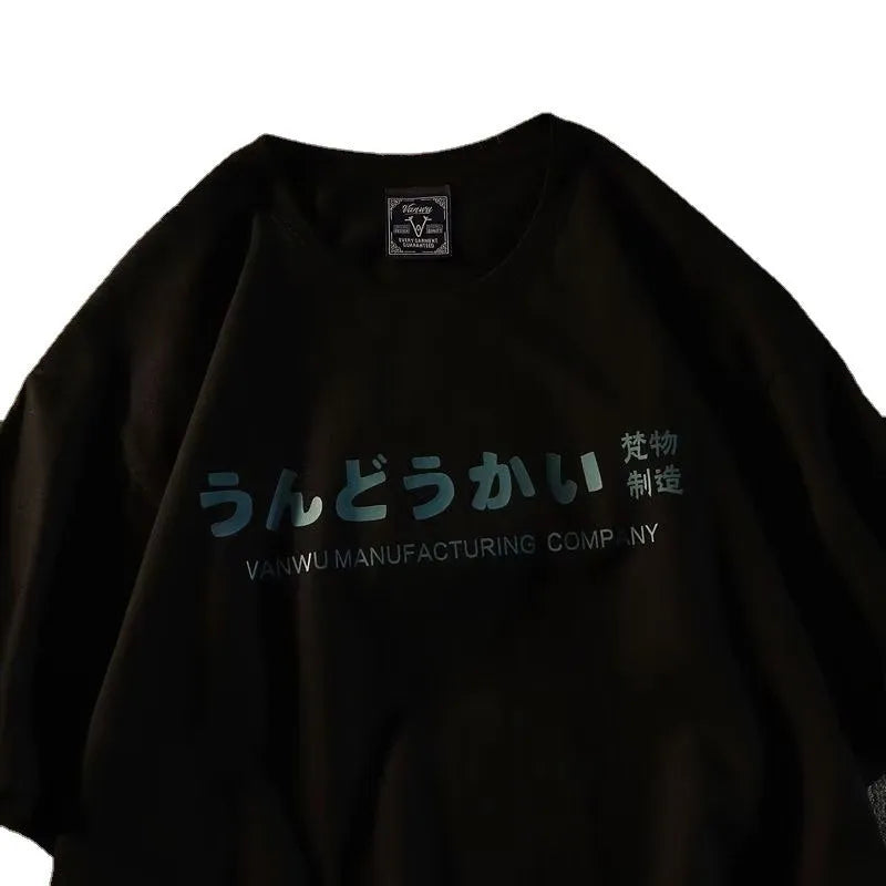 Loose fitting cotton short sleeve t-shirt in black, shown on a hanger.
