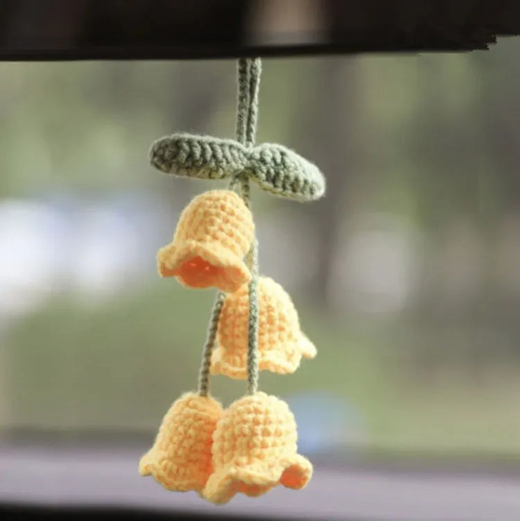 Green and white knitted rope car plant ornament with 8cm base and hanging rope.