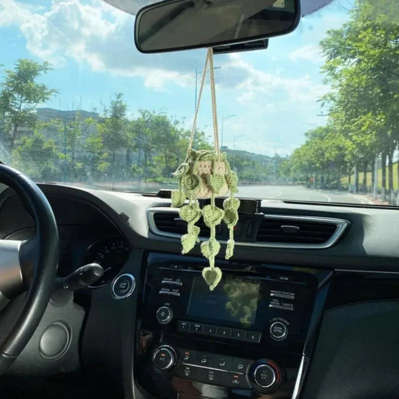 Green and white knitted rope car plant ornament with 8cm base and hanging rope.