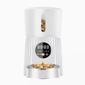 Black and white intelligent pet feeder with USB cable for automatic timing and quantitative remote feeding