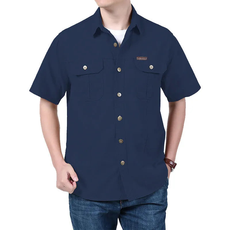 Men's cotton short sleeve loose fit cardigan shirt in dark blue on a model, summer workwear style
