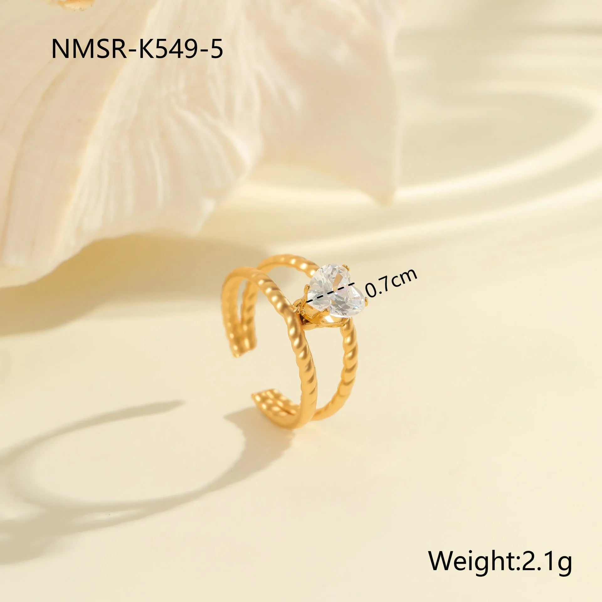 Stainless steel women's ring with gold electroplating and zircon details in geometry design