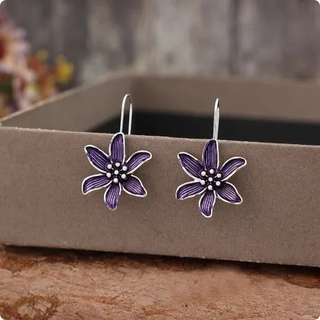 Purple flower-shaped alloy stud earrings with electroplated finish
