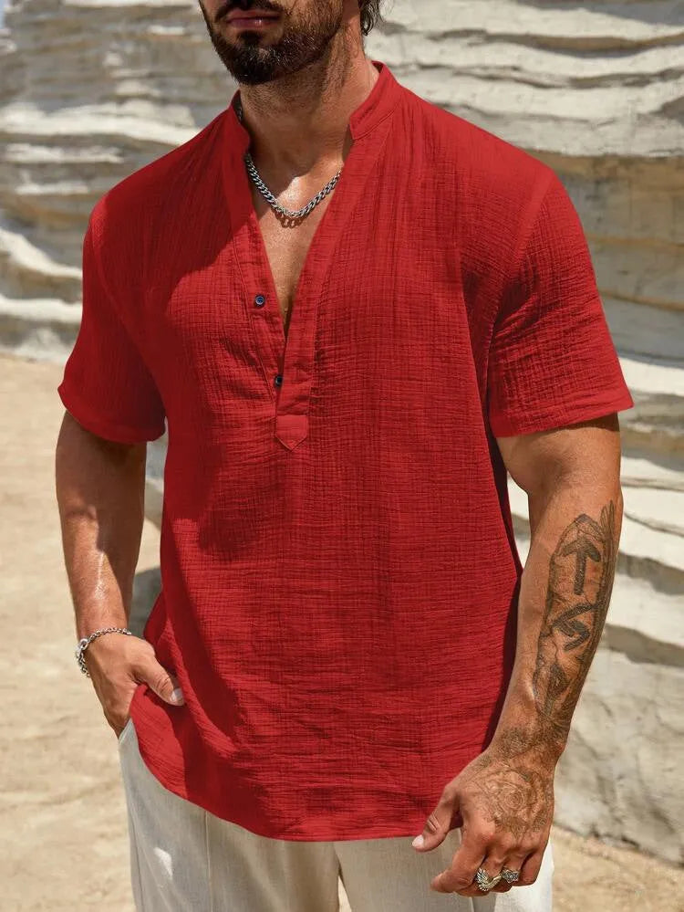Men's solid colour short sleeve casual shirt with stand collar in a light blue shade.