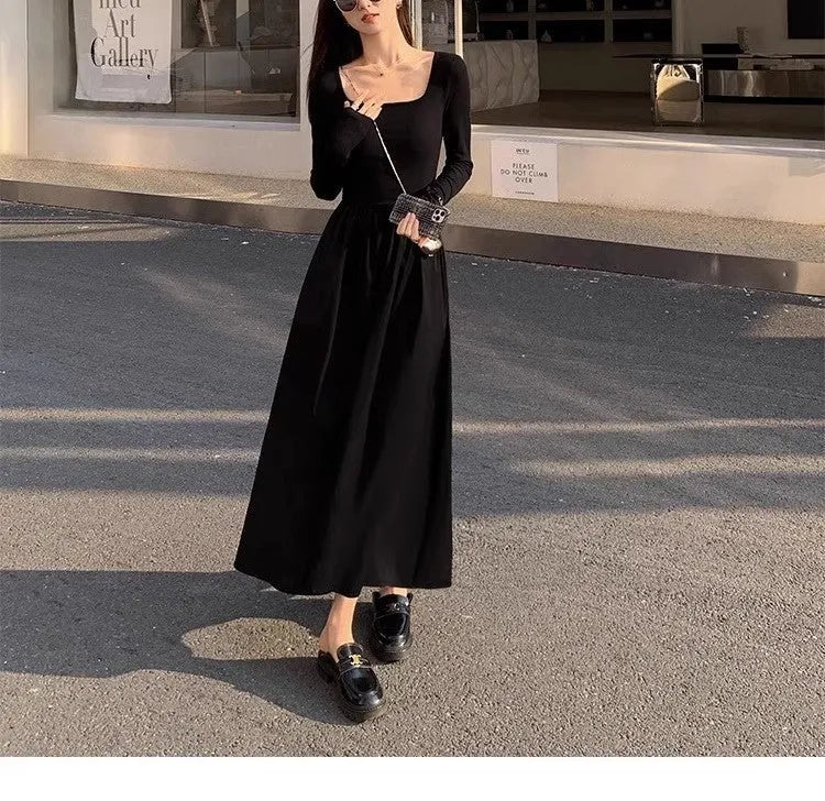 Women's black knitted A-line long sleeve dress with square collar and elasticated waist