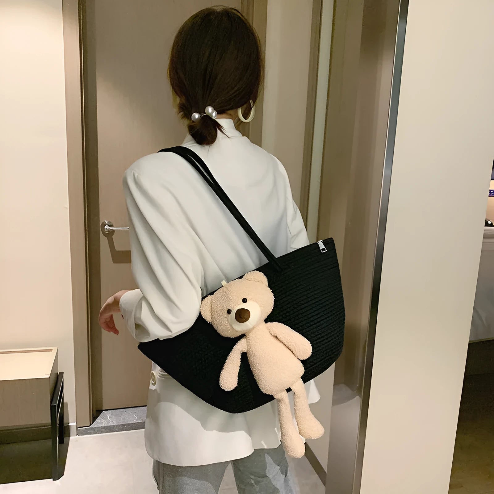 Cotton and linen woven shoulder bag in dumpling shape with three-dimensional pocket and double straps