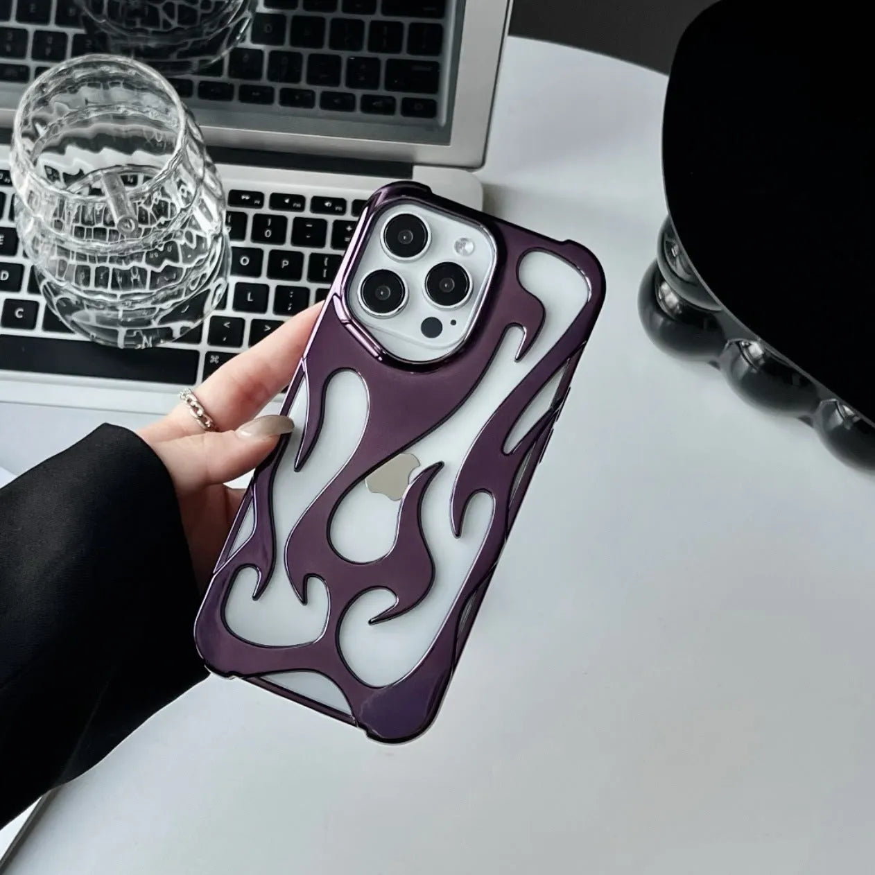 Electroplated hollow flame pattern iPhone case in silver with TPU soft shell construction