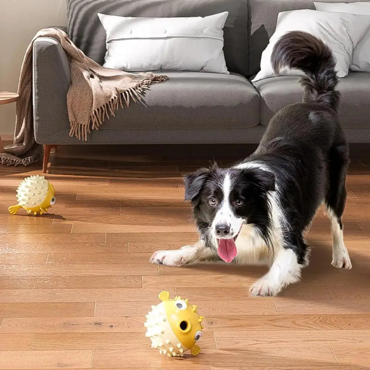 Yellow fish-shaped dog chew toy with textured surface for teeth cleaning