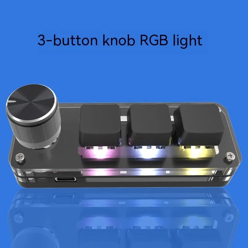 Black programmable mini keyboard with RGB backlit keys for copy and paste commands.