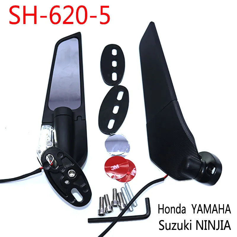 Pair of yellow motorcycle reflectors with convex glass lenses and aluminium alloy bodies for spoiler or mirror mounting.