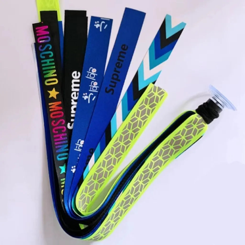 Colourful decorative ribbon streamers attached to a children safety helmet for skating or skiing