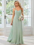 Women's sleeveless pleated A-line dress in light green with sling neckline for banquet occasions