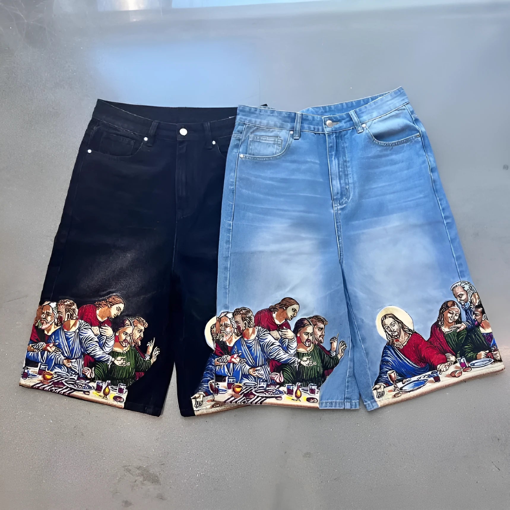 Blue cotton men's shorts with a Jesus Christ screen print on the back pocket, showing tapered leg fit.