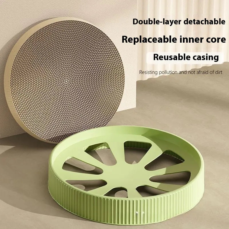 Green and white round cat scratching board with replaceable corrugated cardboard panels.