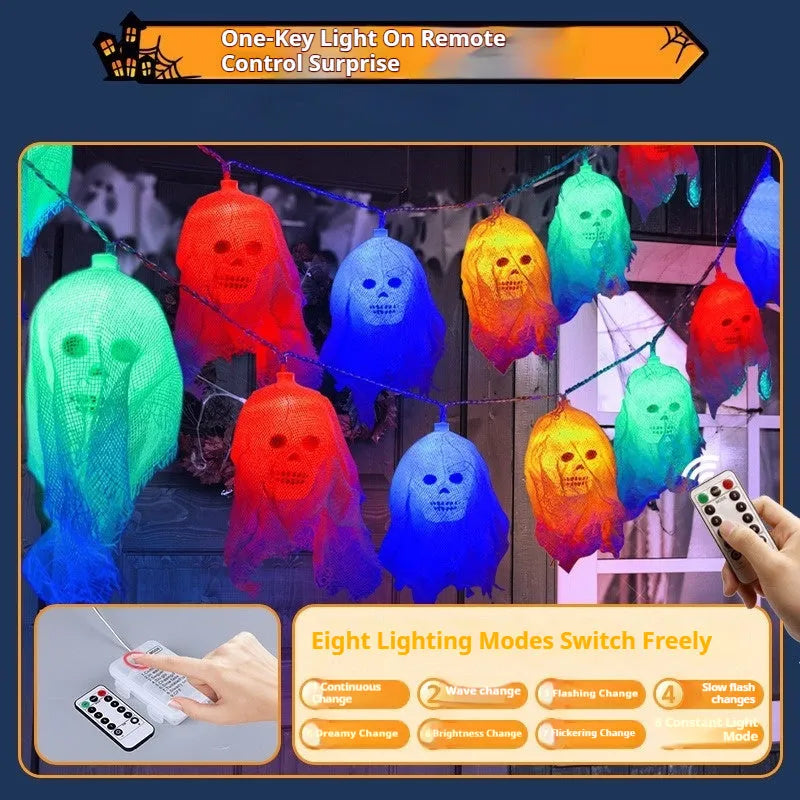 Halloween battery-powered coloured LED string lights on a plastic spool with battery box, options for 1.5m or 2.5m length.