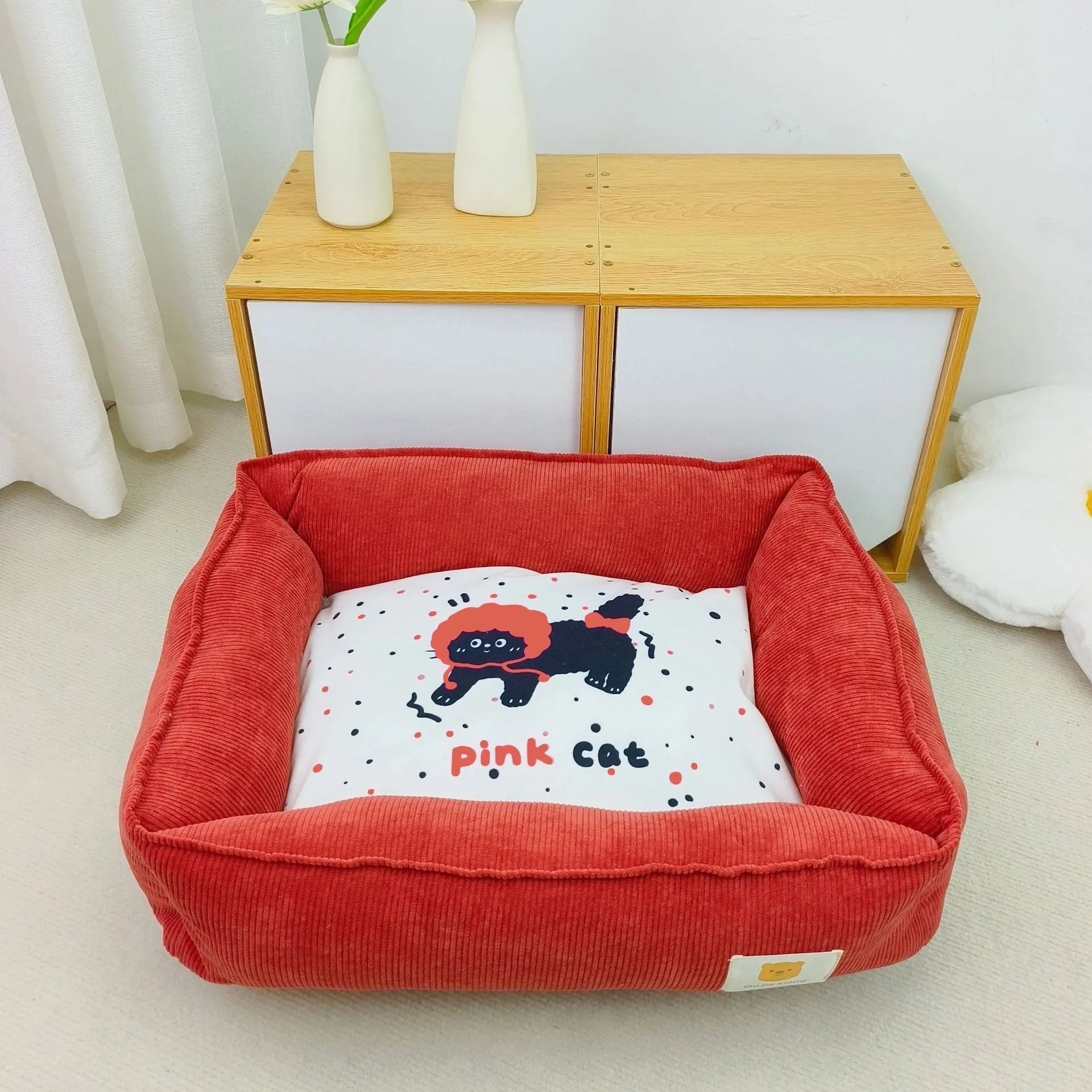 Soft fabric pet winter bed for dogs and cats in light blue colour, showing plush velvet texture.