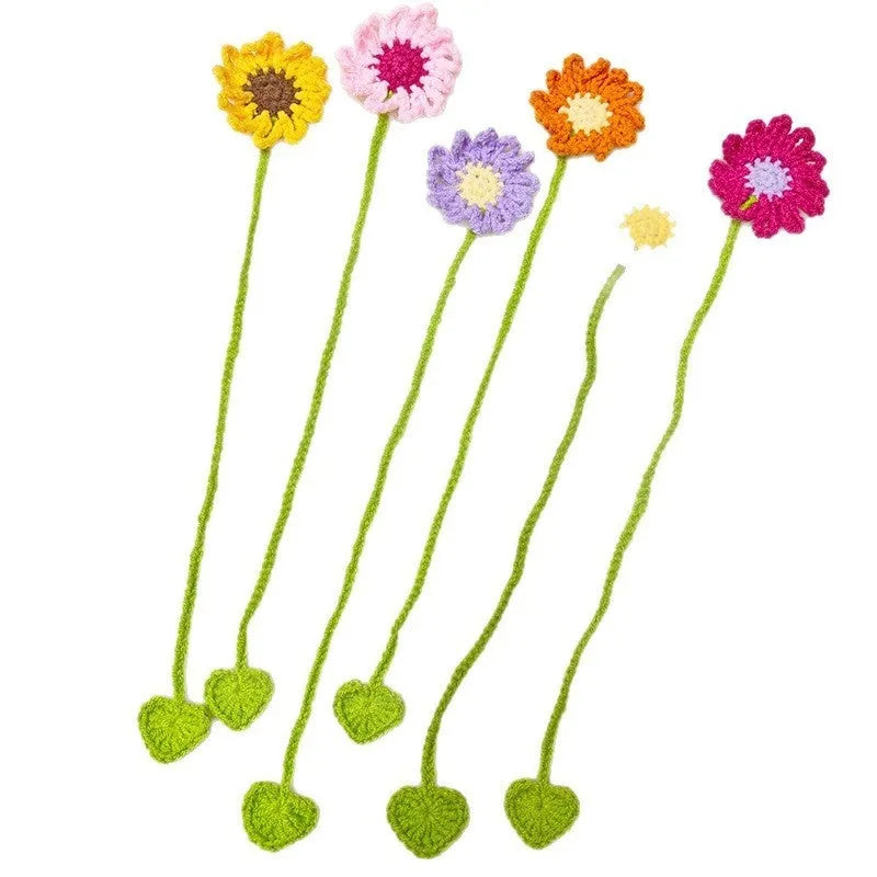 Hand-crocheted wool bookmark with daisy design on flexible wire in multiple colour options