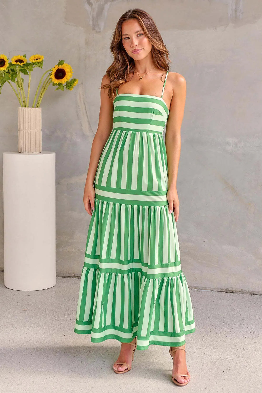 Women's striped printed summer dress with suspender straps and side pockets in blue colour