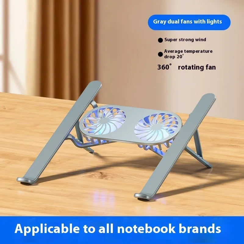 Silver aluminium laptop stand with dual cooling fans in folded position on desk