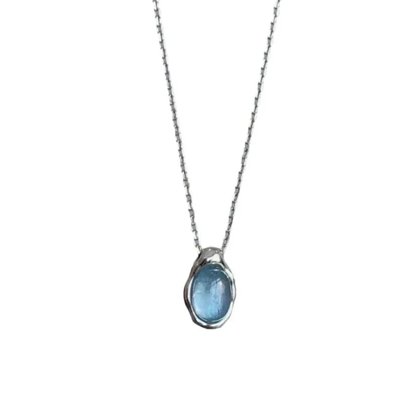 Navy blue geometric water drop pendant necklace with platinum-plated finish on adjustable chain