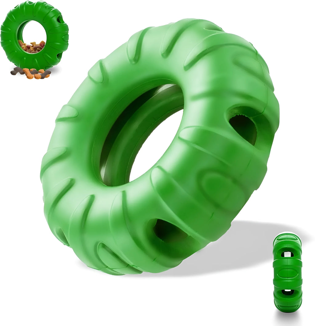Blue rubber tire-shaped dog chew toy with oval openings for treat dispensing on a white background.