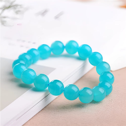 Natural amazonite scattered beads in ice colour with polished surfaces, showing single circle and three ring styles