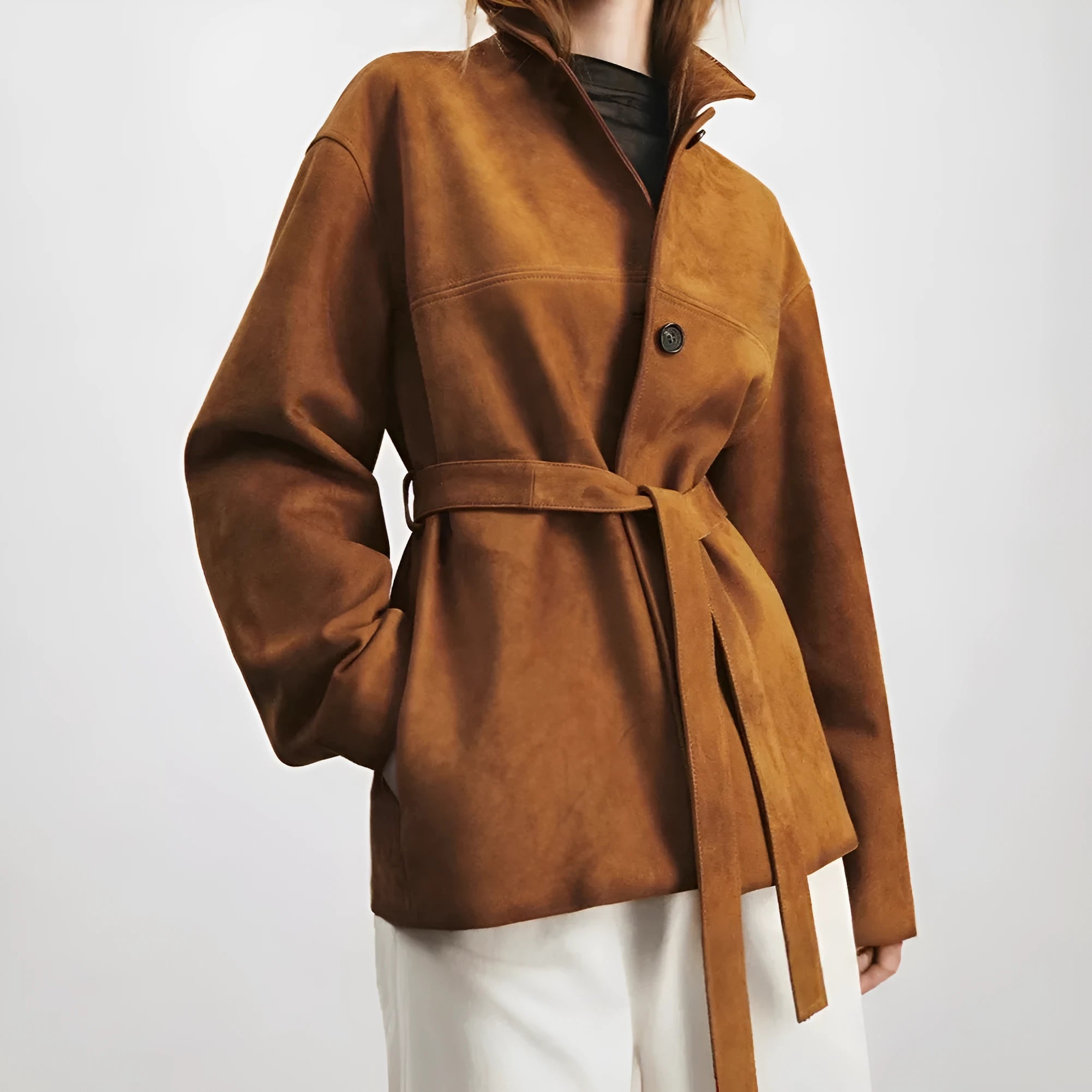 Women's retro-style cashmere coat with Peter Pan collar in yellow brown colour showing leather stitching details