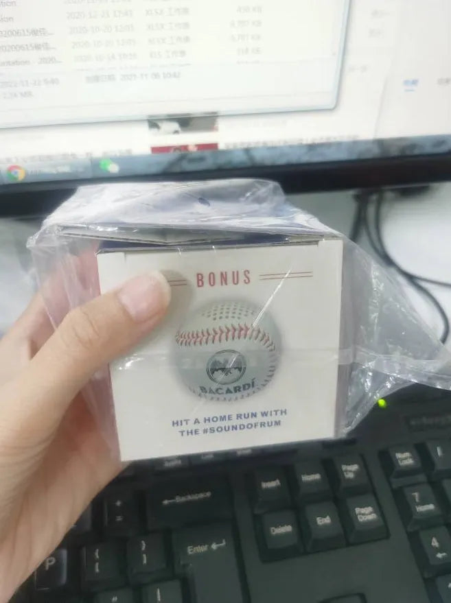 Baseball home Bluetooth speaker in white with 3W output, 600mAh battery, and USB interface