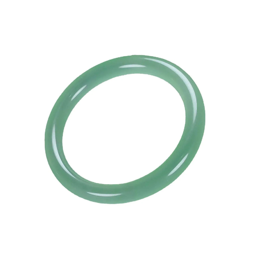 Women's jade bracelet with floating flower design in ice-like emerald appearance