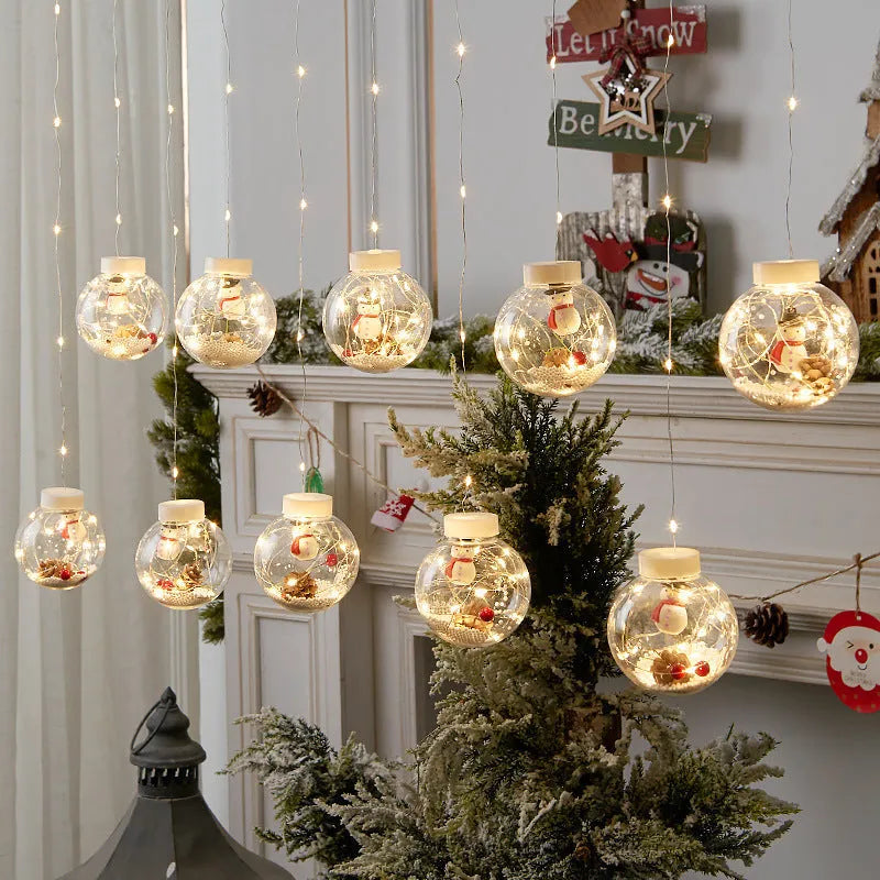 LED Christmas curtain light string with 10 wishing ball lamps showing snowman, Christmas tree and elder designs