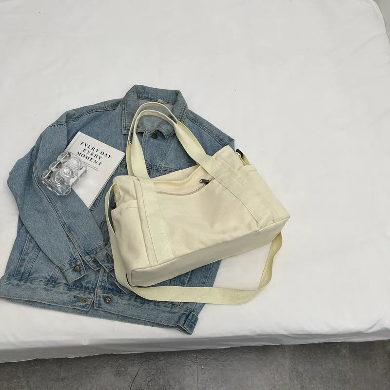 Large capacity shoulder canvas tote bag in solid colour with sandwich pocket and mobile phone compartment